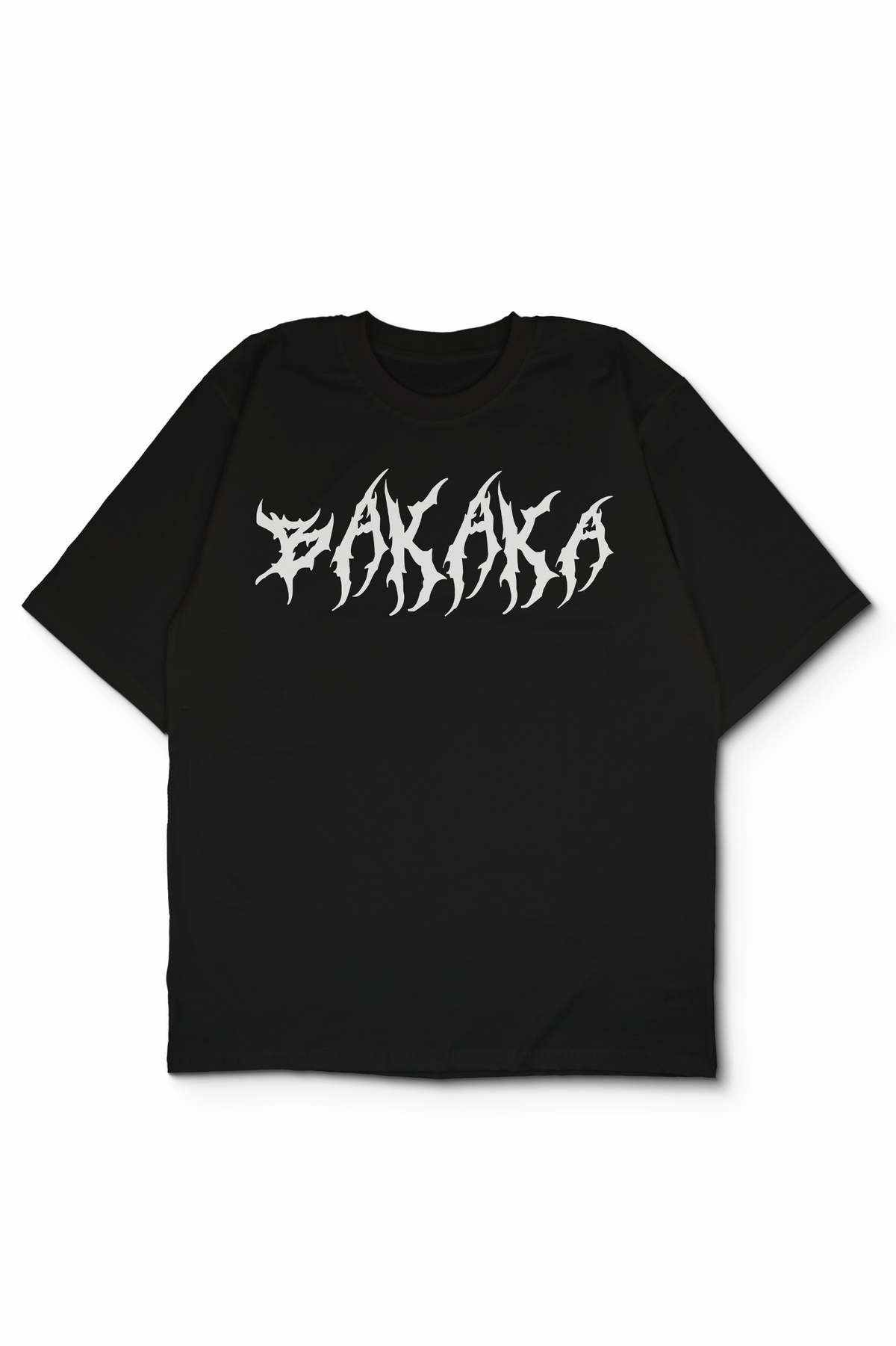 An Oversized t-shirt with a stylized white gothic font graphic reading 'BAKAKA' across the chest, displayed flat against a plain white background. Design by Bakaka.
